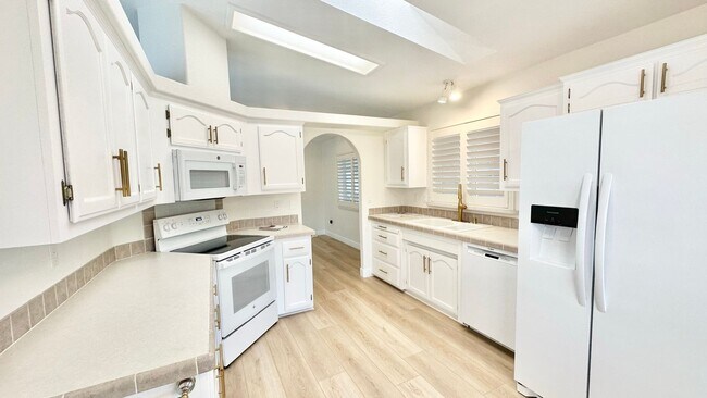 Building Photo - Light, Bright, and Freshly Updated Home in the Gated & Desirable Champagne Village 55+ Community!