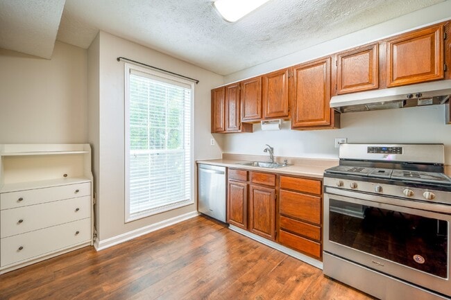 Building Photo - Updated two-bedroom, two-bathroom condo in...