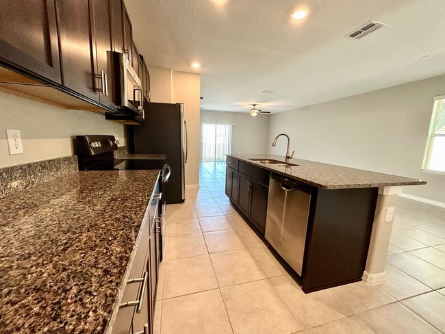 Building Photo - Immaculate 5 Bedroom 2.5 Bathroom Home in ...