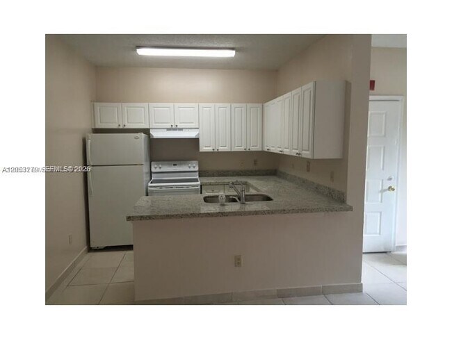 Building Photo - 18304 NW 68th Ave
