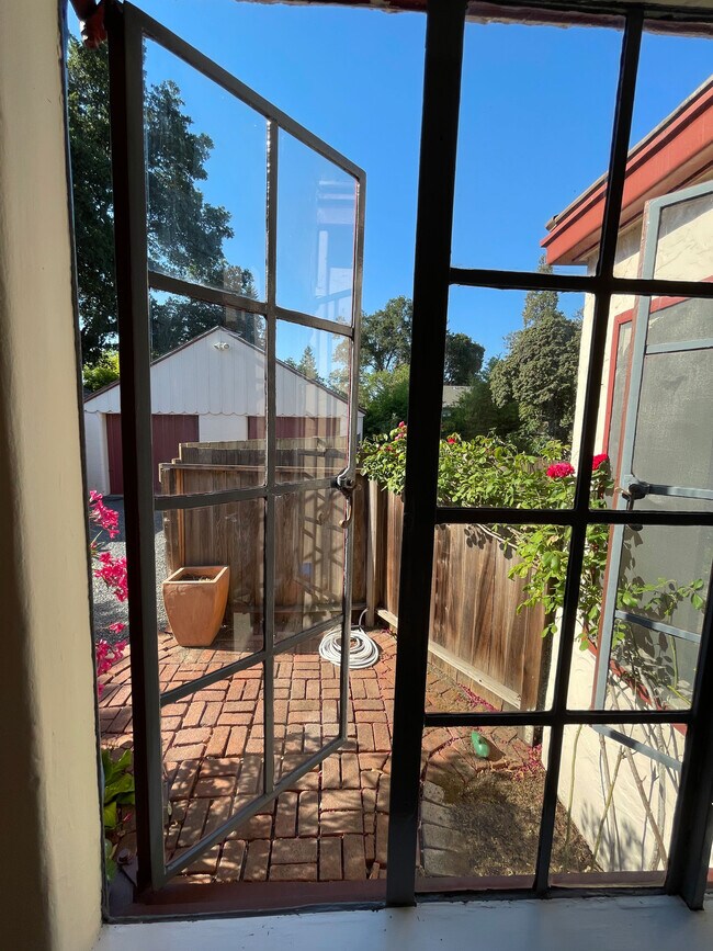 View from kitchen window. - 517 Benton St