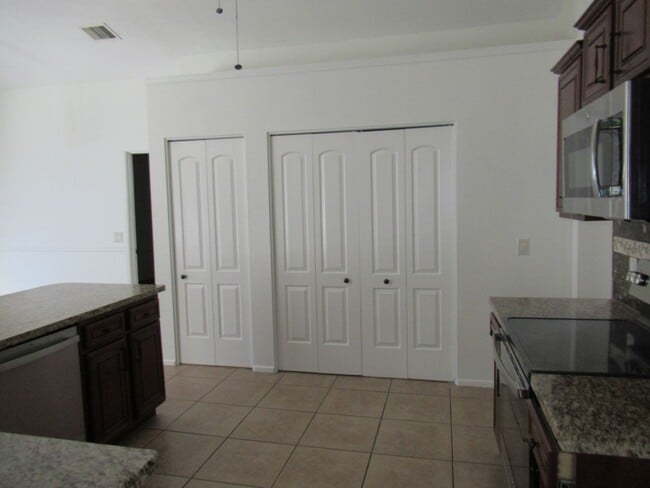 Building Photo - Nice 4 Bedroom + Den Home With Pool In AHW...