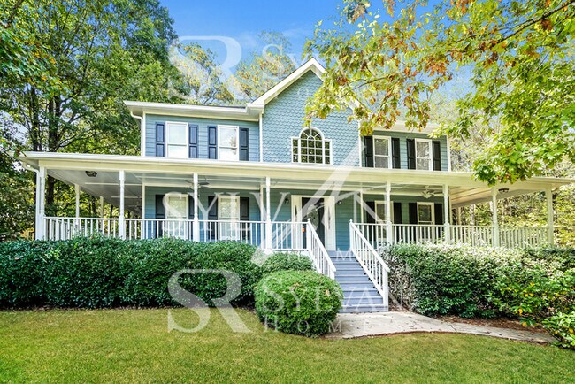 Building Photo - The living is easy in this 4 bedroom, 2.5 ...