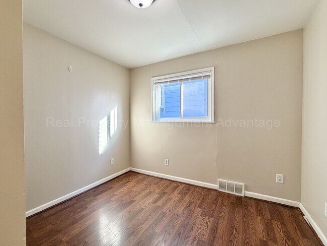 Building Photo - Solid Brick and Renovated with New Kitchen and Two Full Baths!