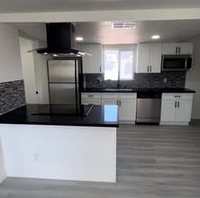 Building Photo - Modern Living! All-New Remodel with LED Li...