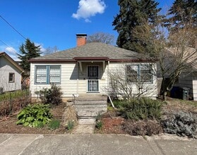 Building Photo - St. Johns 1940s 2Bd 1Ba home with updated Kitchen and a Basement! Features a Stained glass Outdoo...