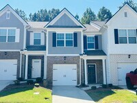 Building Photo - Wow 3 bedroom 2.5 bathroom townhome minute...