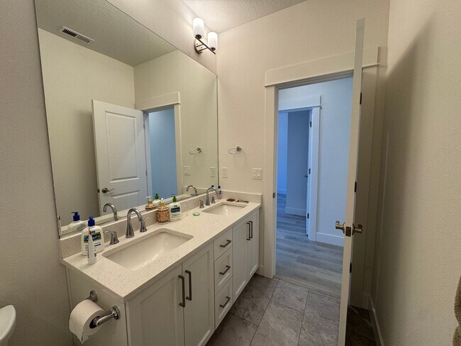Building Photo - Modern and Immaculate 4-Bedroom Bethany Home with Designer Finishes and Fenced Yard