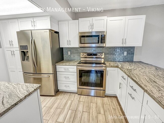 Building Photo - Renovated 2 Bed 1.5 Bath 1 Car Garage! - D...