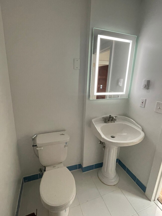 Upstairs bath shelves to be added - 307 S Baylis St