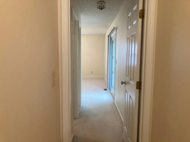 Building Photo - Beautiful Duplex Located in Serene, Wooded...
