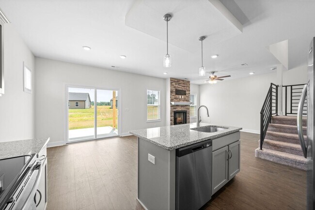 Building Photo - Pet Friendly Three Bedroom with Bonus!