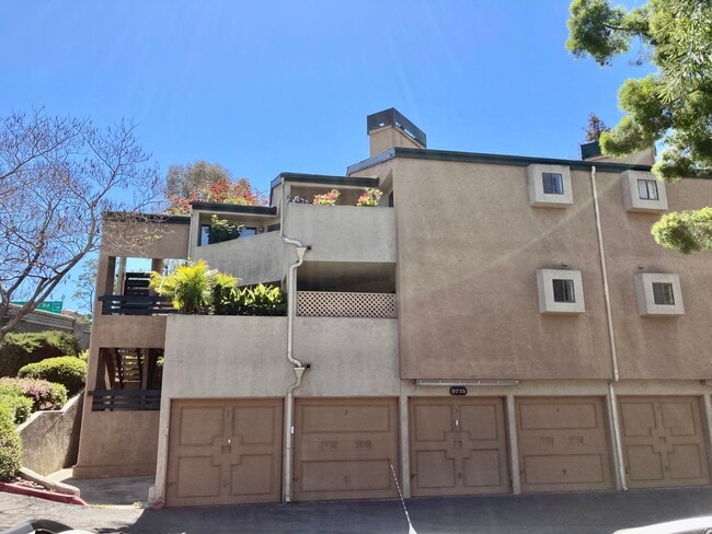 Building Photo - One Bedroom with Garage and IN-Unit laundry in Resort-Style Complex