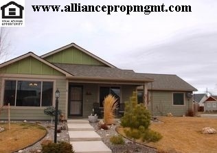 Building Photo - Centrally-located 3 bedroom home with paved RV parking.