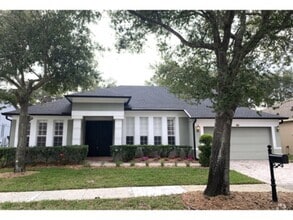 Building Photo - BEAUTIFUL SINGLE FAMILY HOME IN GATED COMM...