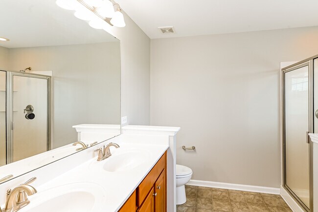 Building Photo - Inviting 4 Bedroom home with Great Location
