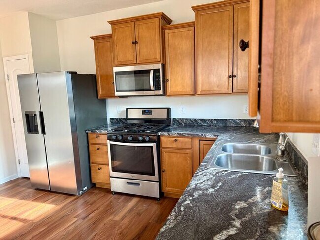 Building Photo - Spacious 4BR 2B w/ Large Backyard • Full Appliance Kitchen • 2-Car Garage in Pataskala