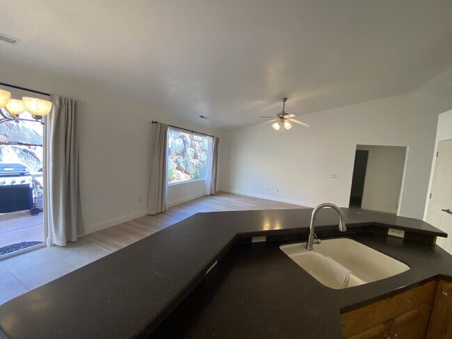 Building Photo - Charming 3-bedroom, 2-bathroom residence i...