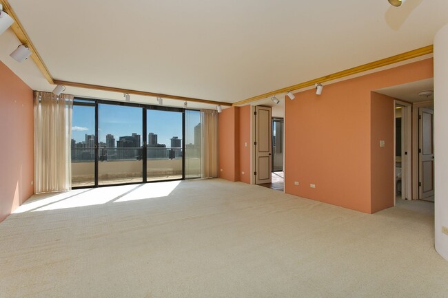 Building Photo - Royal Iolani Corner Unit - 2 PRK w/ ALL Ut...