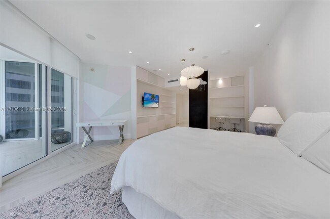 Building Photo - 10225 Collins Ave