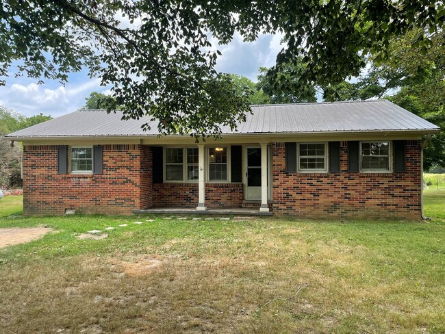 Building Photo - Timeless Brick Home with Large Yard!