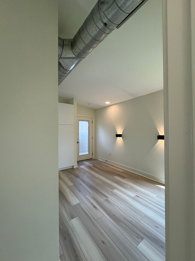 Building Photo - Vaulted Ceilings & Hardwood Floors in This Charming Indianapolis L