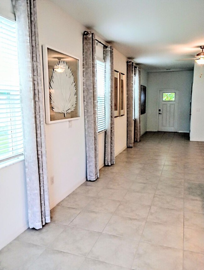 Building Photo - Townhouse in Land O' Lakes - The Townes at Lake Thomas