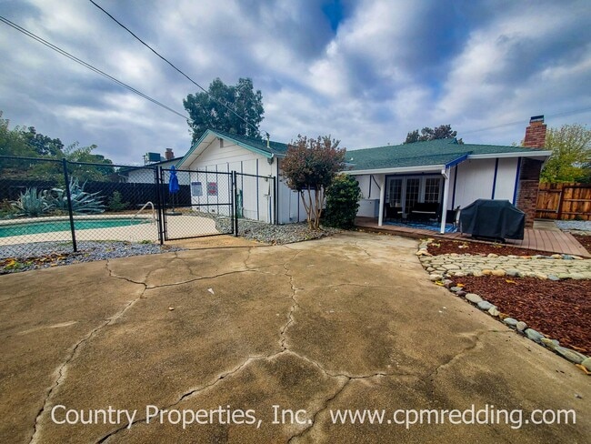 Building Photo - Spacious 3-Bedroom House with Gated Pool i...