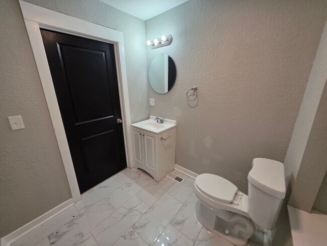 Building Photo - Spacious 4-Bedroom, 2.5-Bath Home with Hardwood Floors