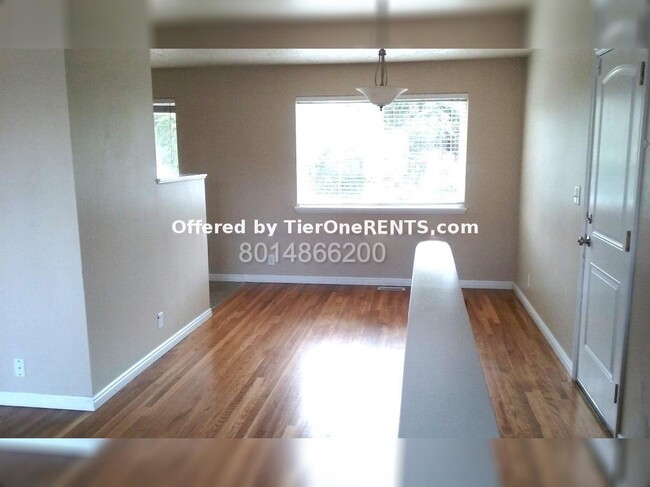 Building Photo - Charming 4-Bedroom Home with Hardwood Floo...