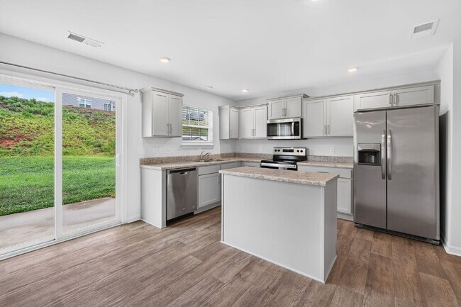 Building Photo - Experience Spacious Comfort: 3-Bedroom Home with 2.5 Baths.