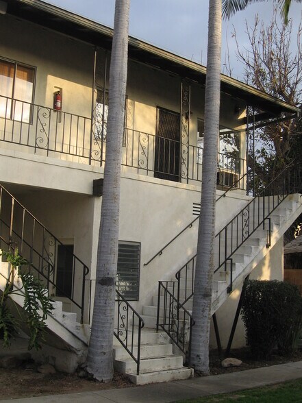 Unit accessible via stairs; shared laundry room located on ground floor. - 6230 Milton Ave