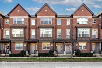 Building Photo - Luxury Townhome with 3 Bedrooms, 2.5 Baths, and 2 Car Garage Located in Vernon Hills in the Aspen...