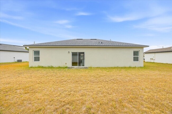 Building Photo - Stunning 4-Bedroom, 2-Bath Home in Poinciana with Modern Upgrades