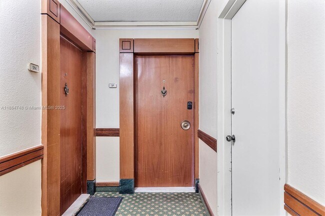 Building Photo - 5555 Collins Ave