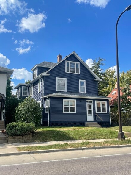 Updated siding and roof - 3312 Hennepin Ave