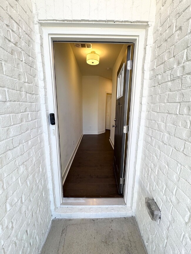 Building Photo - Stylish 3BR Townhome with Private Yard & T...