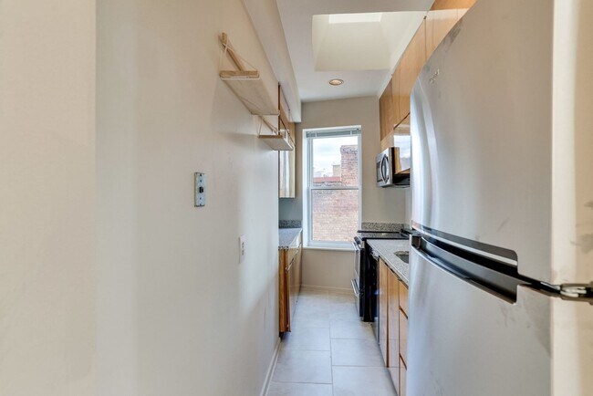 Building Photo - Top Tier Two-Level Abode-- Storage and Parking Included!