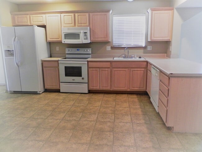 All appliances included - 9840 N Lewis Ave