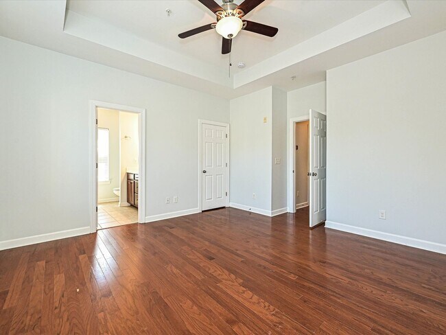 Building Photo - Stylish Condo Living with Open Concept, Garage & Outdoor Space