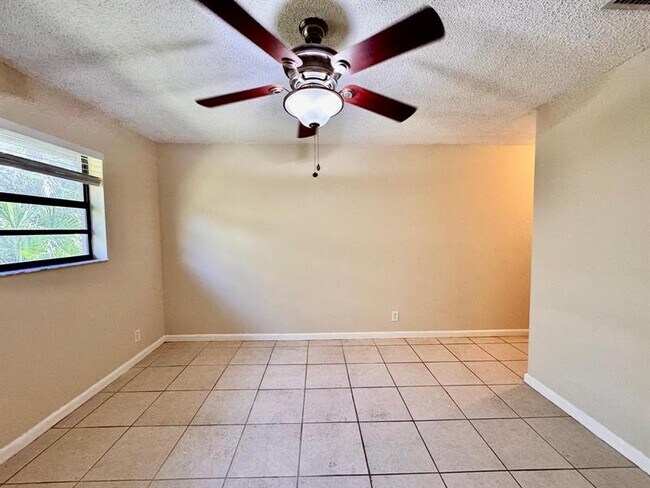 Building Photo - 11211 Royal Palm Blvd
