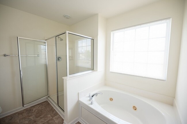 Building Photo - Spacious beautiful 4 bedroom 2.5 bath home  In Greensboro with an office/upstairs loft/ sunroom/ ...