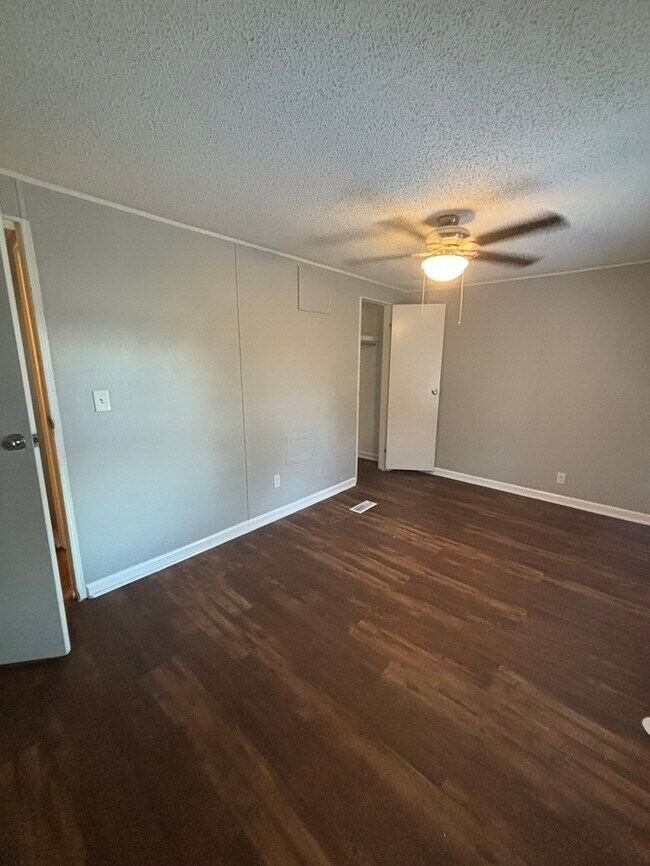 Building Photo - Triangle Mobile Home Park