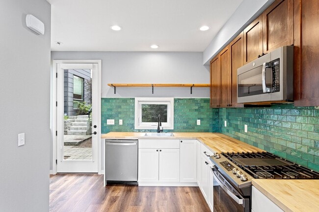 Building Photo - Hip and Modern Townhome In Greenwood!  Two bedrooms plus Flex Space Room