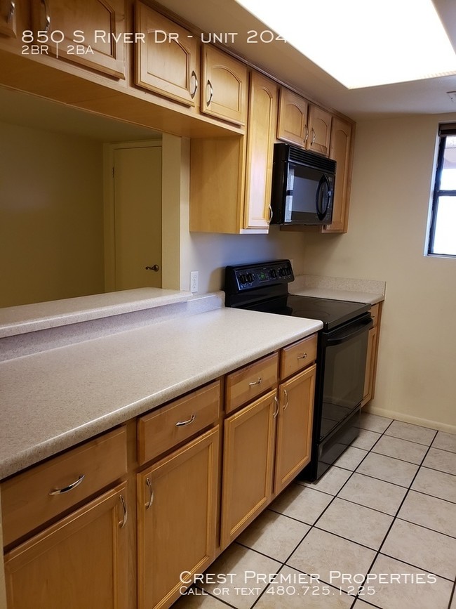 Building Photo - Questa Vida Condo