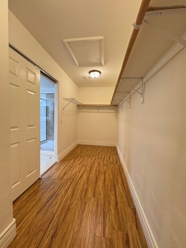 Building Photo - LUXURY LIVING • GOLF COURSE VIEW • GUARD-GATED COMMUNITY