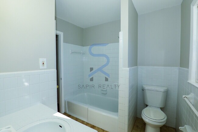 Building Photo - Move in before January 31st and choose your reward: a $250 Amazon Gift Card or a 55" Smart TV!