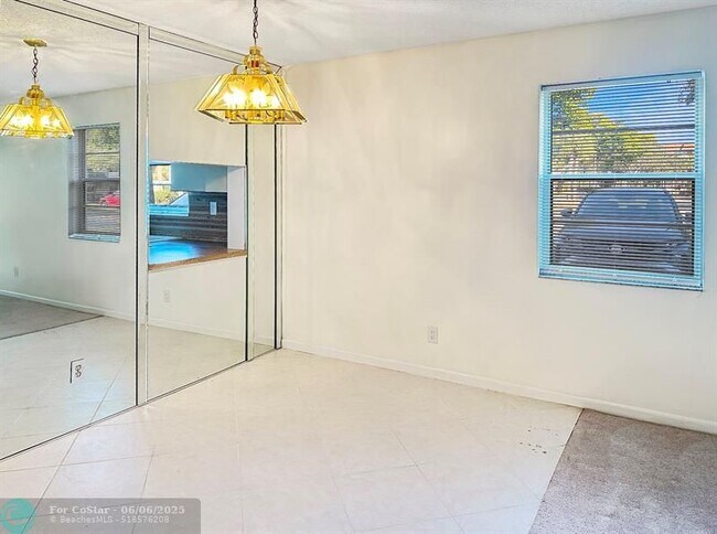 Building Photo - 6090 N Sabal Palm Blvd