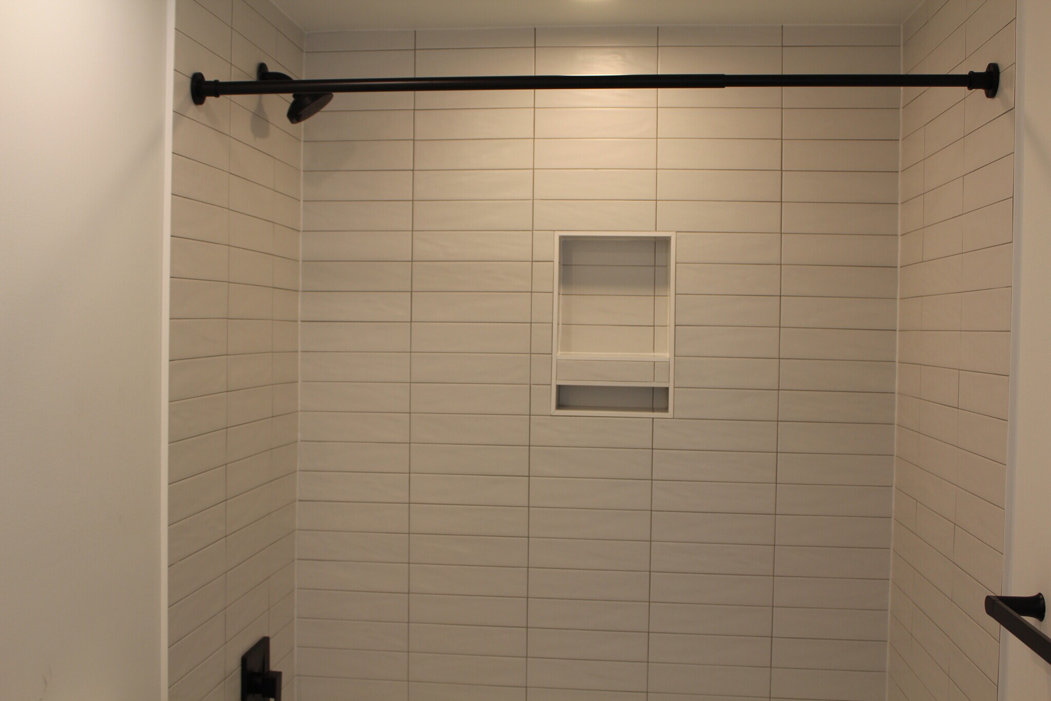 tiled shower wall - 3817 14th St NW