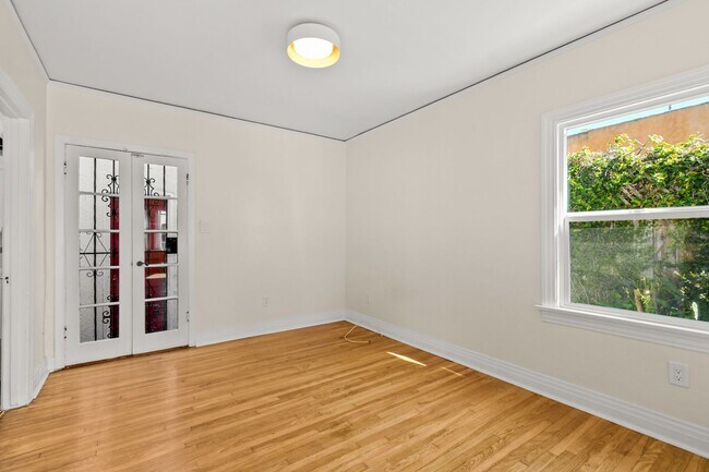Building Photo - Move In Special!!  Elevated Golden Hill 2BR with Southwesterly Views with A/C & Detached Garage